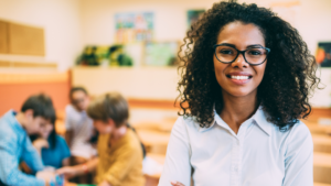 A teacher standing in front of a group of students